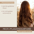 Frau mit langen, warm goldbraunen, glänzenden Haaren, Pflanzenhaarfarbe Produktbild