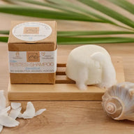 Festes Shampoo sensitiv mit Schaum, braune Verpackung, Muschel, Kokos und Palmenblatt